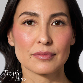 LAURA GELLER Baked Blush-n-Brighten Powder Blush Tropic Hues applied on model