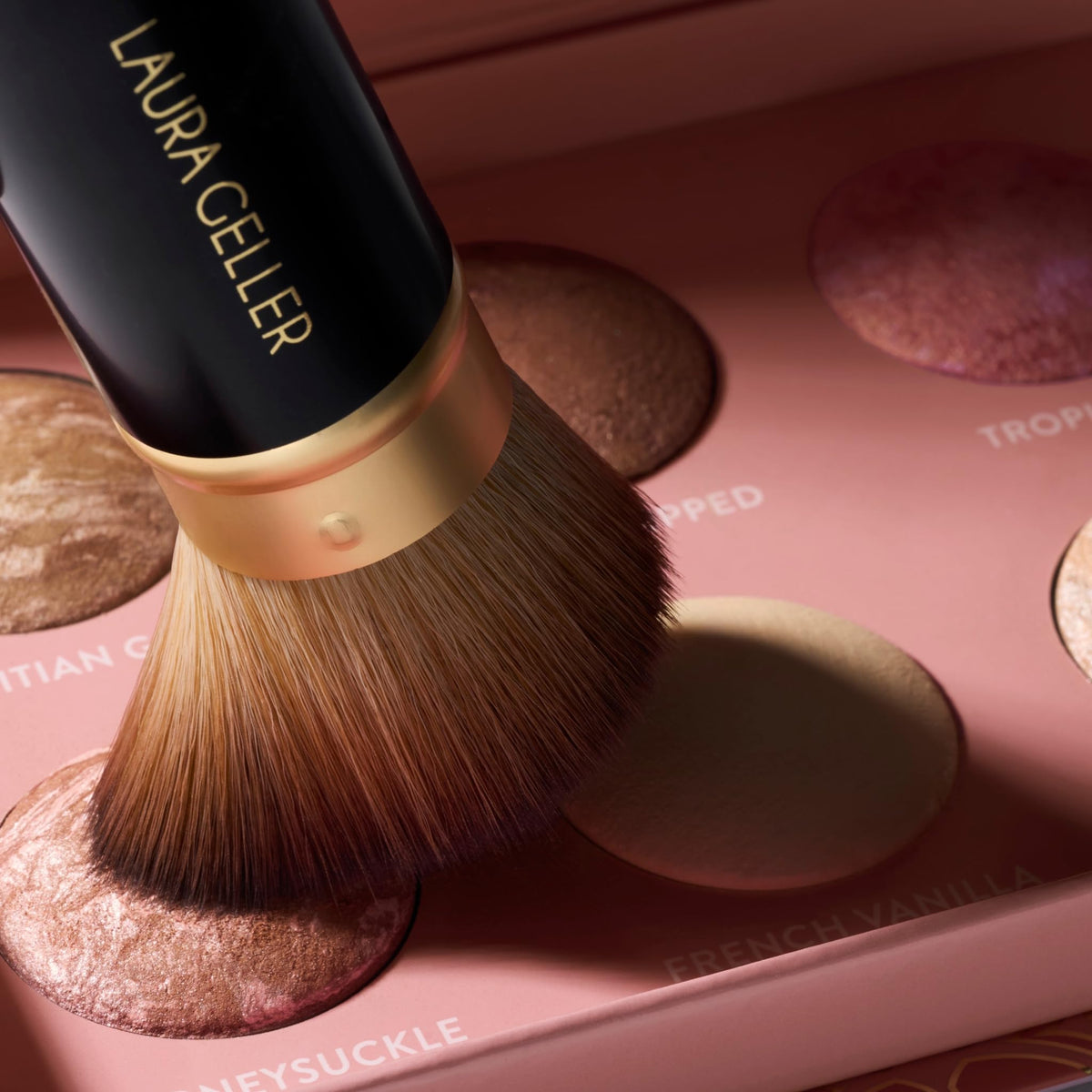 LAURA GELLER Cheek to Chic Tropical Glow Palette on vanity