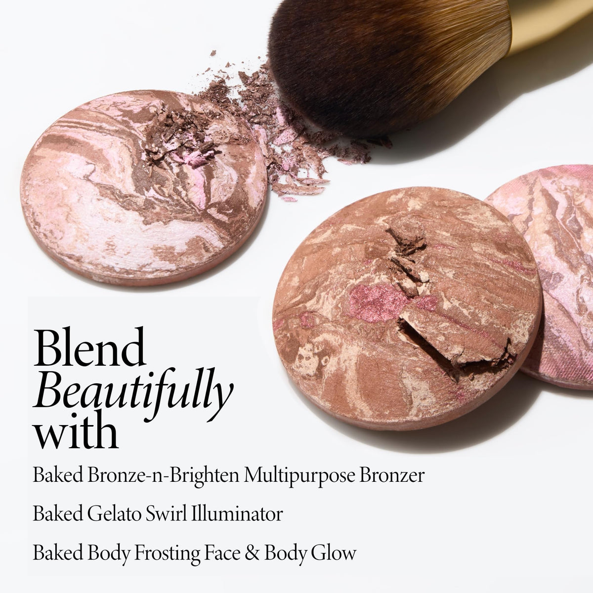LAURA GELLER Classic Bronzer Brush on a vanity with makeup products