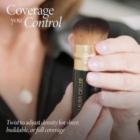 LAURA GELLER Kabuki Brush applying liquid foundation
