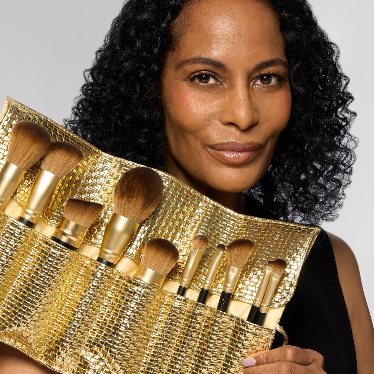 LAURA GELLER The Brush Vault brush set on a vanity