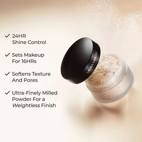 Laura Mercier Translucent Loose Setting Powder on makeup table