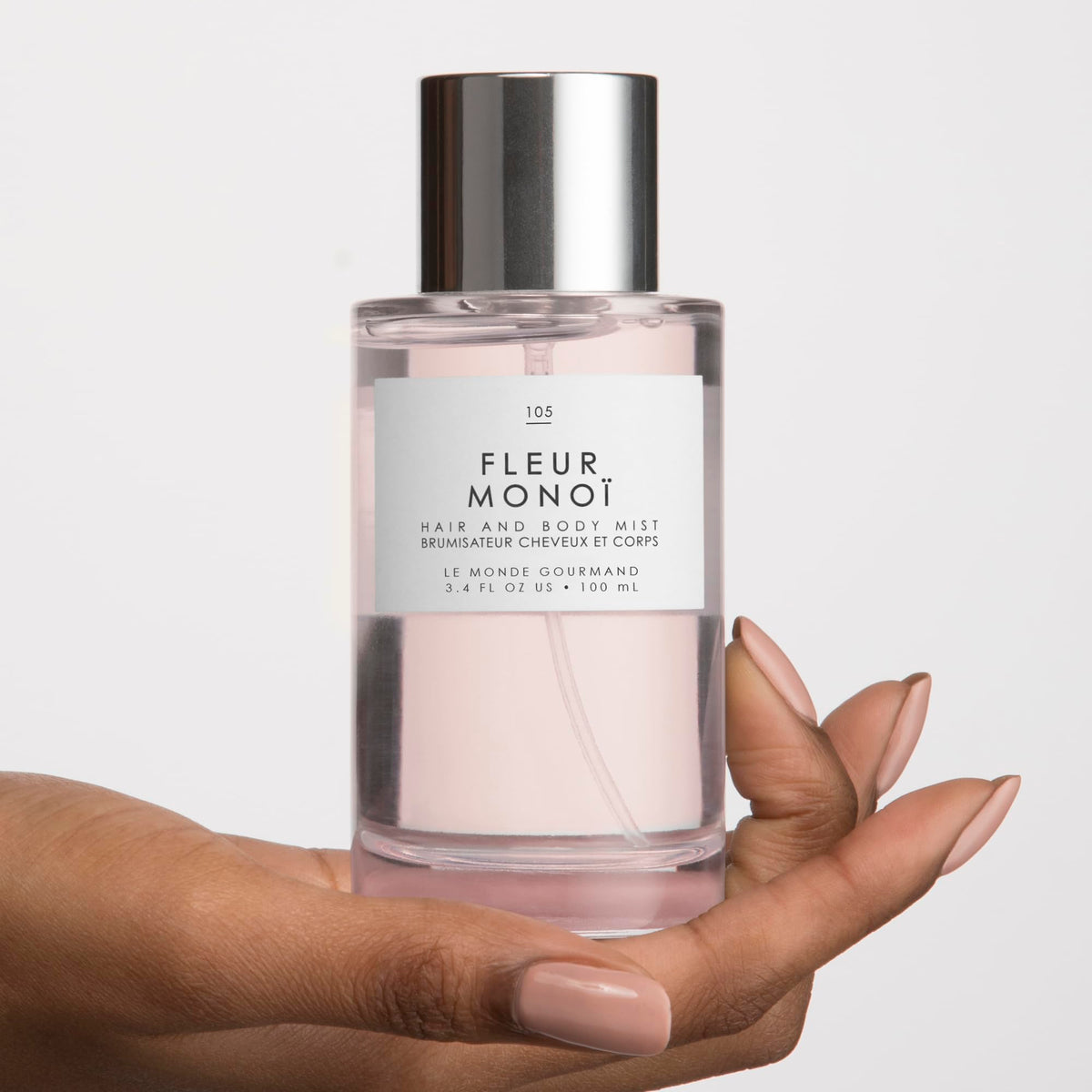 Le Monde Gourmand Fleur Monoi Hair & Body Mist 100ml on a vanity