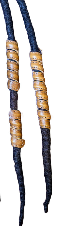 Leather hair bead used in a ponytail holder