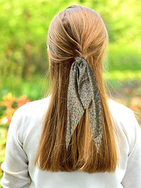 LFOUVRE floral scrunchies displayed with ribbon