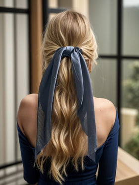 LFOUVRE hair ribbon tied around a ponytail