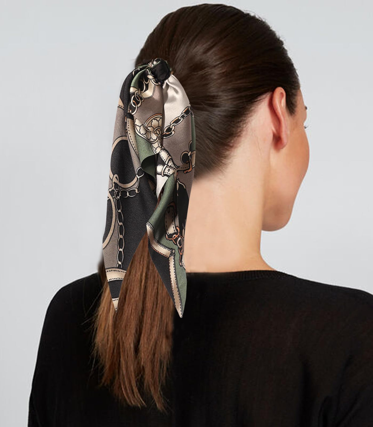 LFOUVRE hair scrunchie in different styles on a flat surface