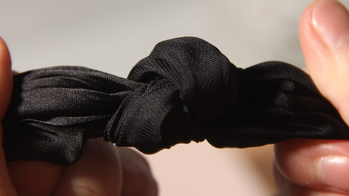 LFOUVRE hair scrunchie worn as a bracelet