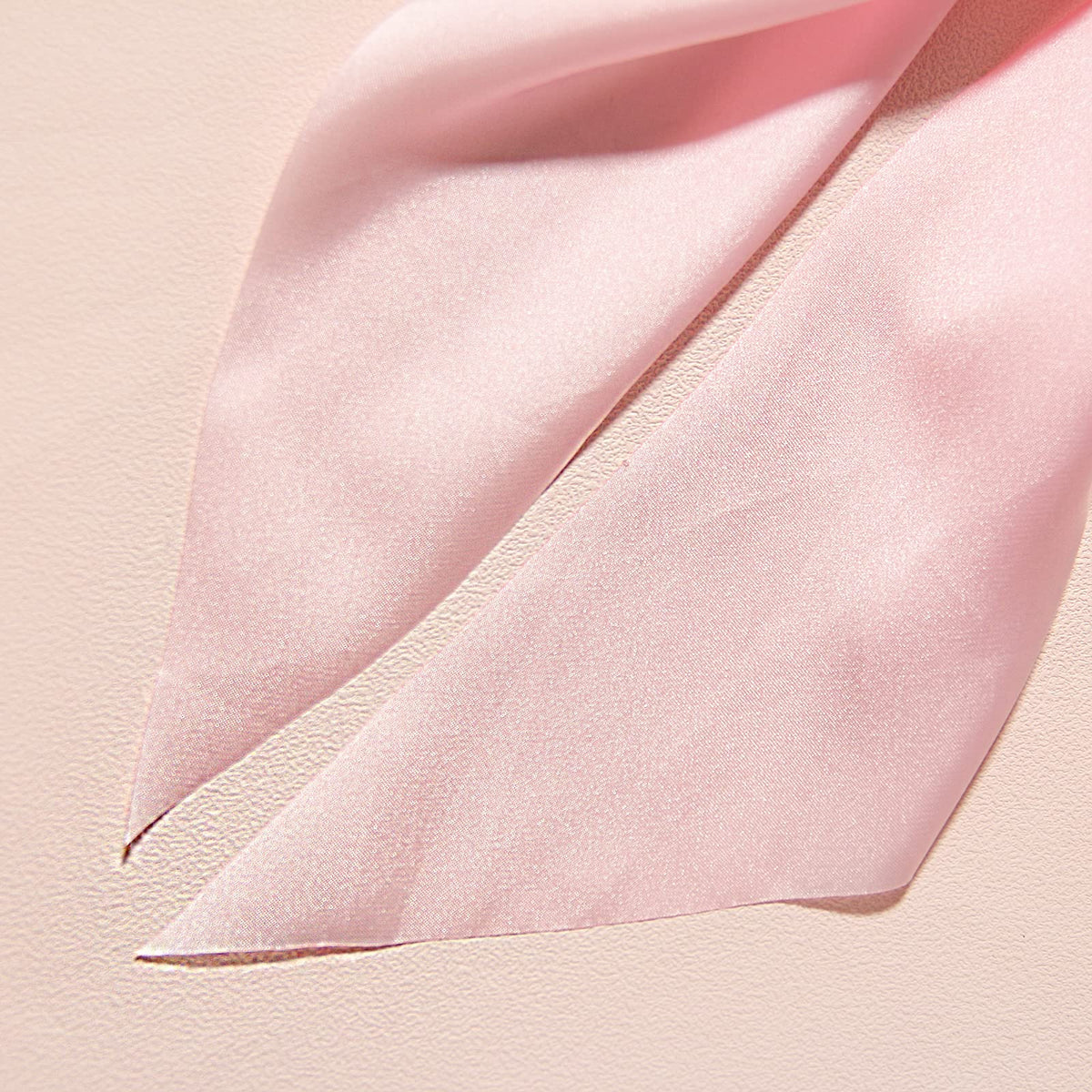 LFOUVRE hair scrunchie wrapped around a bun