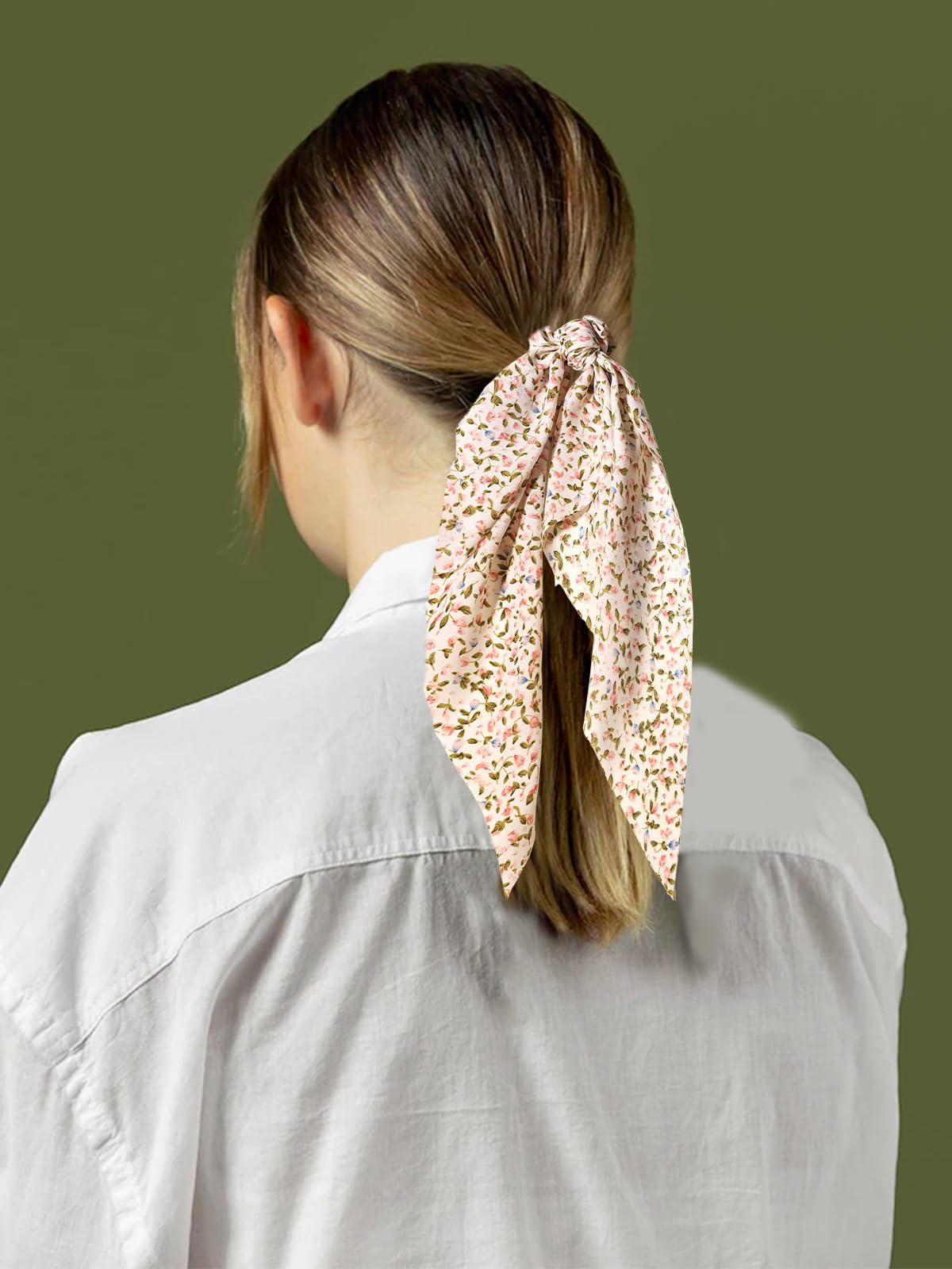 LFOUVRE scrunchies tied in a ponytail with ribbon
