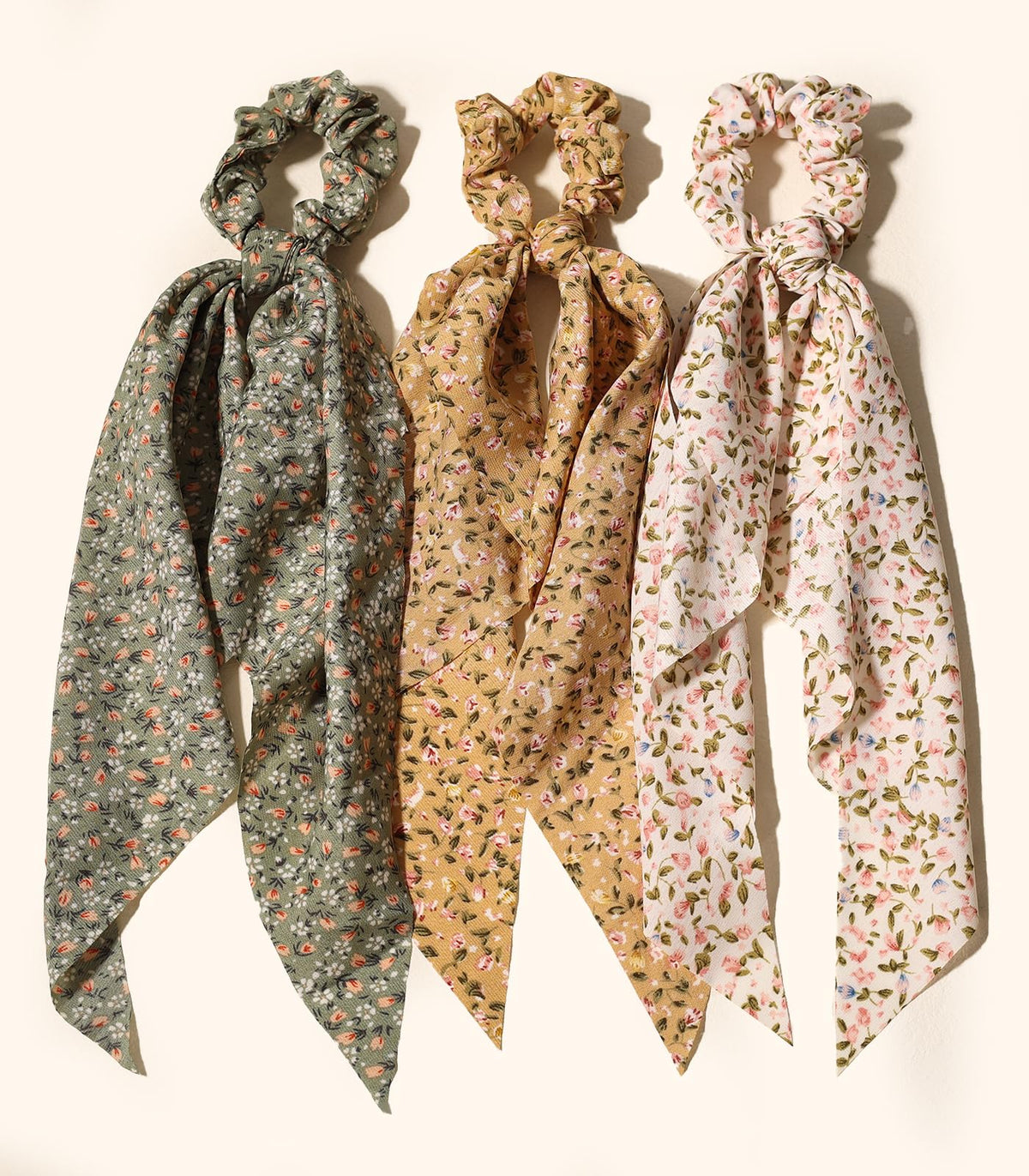 LFOUVRE scrunchies worn as a bracelet