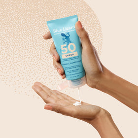 Lifestyle image of BLUE LIZARD Sheer Mineral Sunscreen at the pool