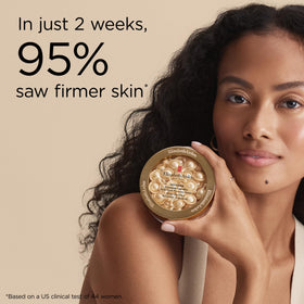 Lifestyle image of Elizabeth Arden capsules on a vanity