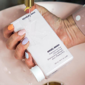 Lifestyle image of KEVIN.MURPHY Angel Wash and Rinse in bathroom