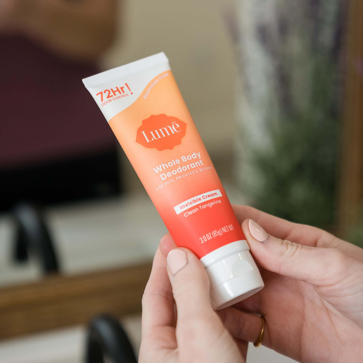 Lifestyle image of Lume Whole Body Deodorant in bathroom setting