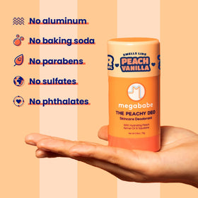 Lifestyle image of Megababe Peachy Deo on a bathroom counter