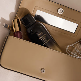 Lifestyle image of ORIBE Impermeable Anti-Humidity Spray in use