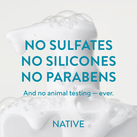 Lifestyle image of person using Native Shampoo