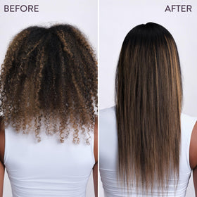 Lifestyle image of Pureology Smooth Gloss Silkmorphose Spray on vanity