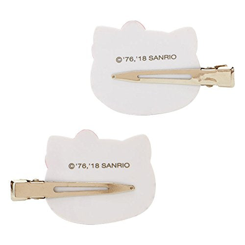 Lifestyle image of SANRIO Hello Kitty Bangs Clip in use while applying makeup