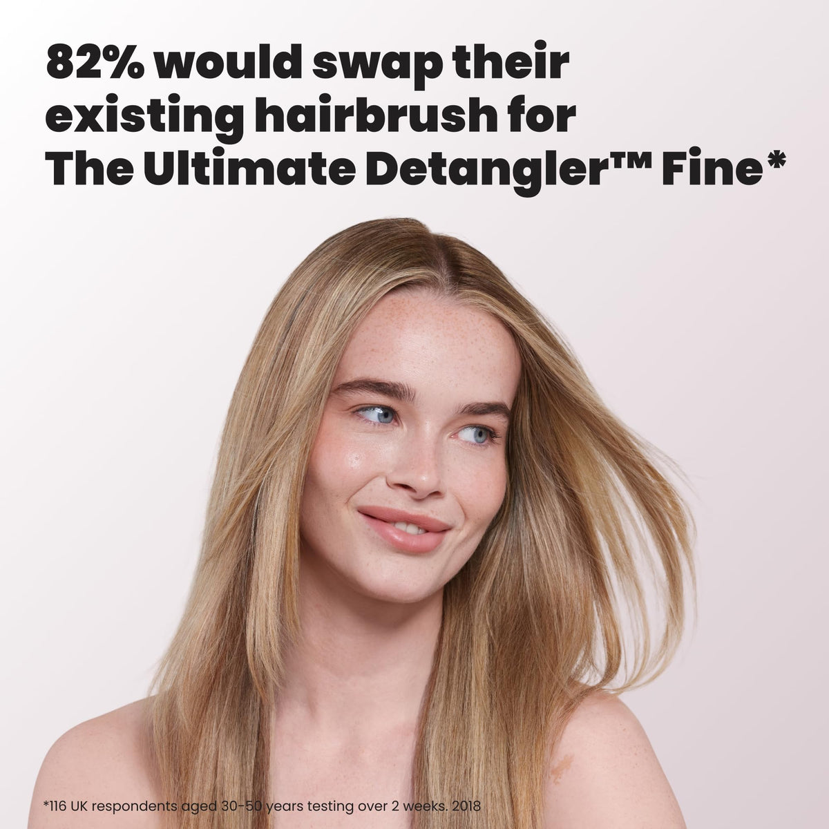 Lifestyle image of TANGLE TEEZER Fine Ultimate Detangler Brush on a bathroom counter