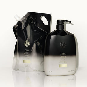 Lifestyle scene of ORIBE Gold Lust Shampoo in bathroom setting