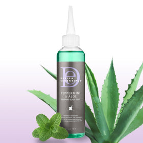 Lifestyle scene showing Design Essentials Scalp Tonic in use