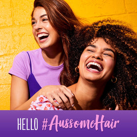 Lifestyle scene using Aussie Miracle Moist Shampoo in the shower