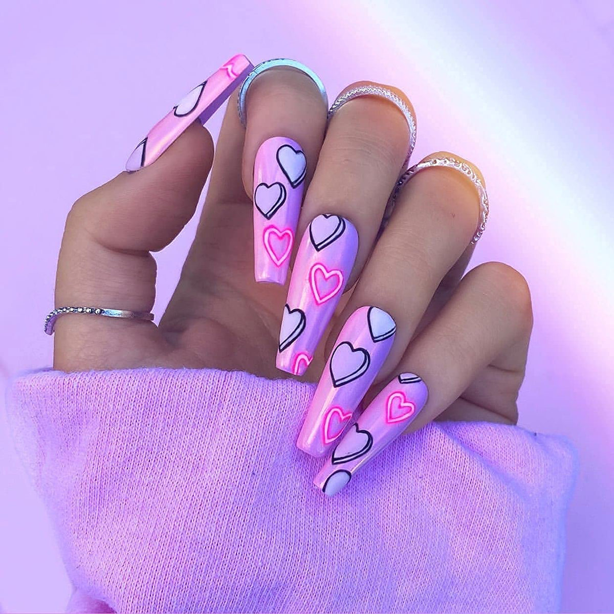 Lifestyle scene with BTArtbox coffin nails applied