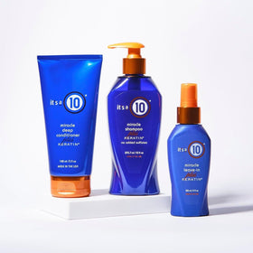 Lifestyle scene with It's a 10 Haircare Miracle Leave-In Conditioner Spray on a vanity