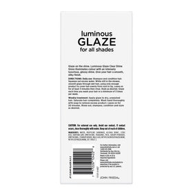 Lifestyle scene with John Frieda Luminous Glaze Clear Shine Hair Gloss in bathroom setting