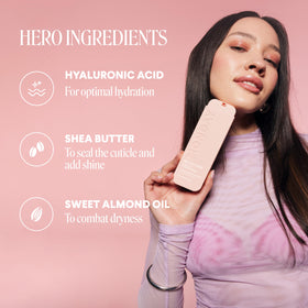Lifestyle scene with MONDAY HAIRCARE Moisture Leave-in Conditioner on a bathroom shelf