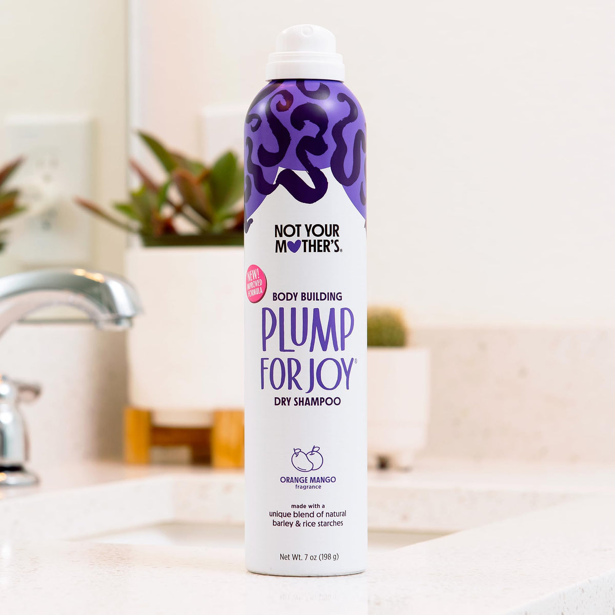 Lifestyle scene with Not Your Mother's Plump For Joy Dry Shampoo