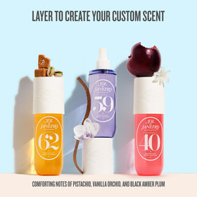 Lifestyle scene with Sol de Janeiro Cheirosa Perfume Mists on a vanity