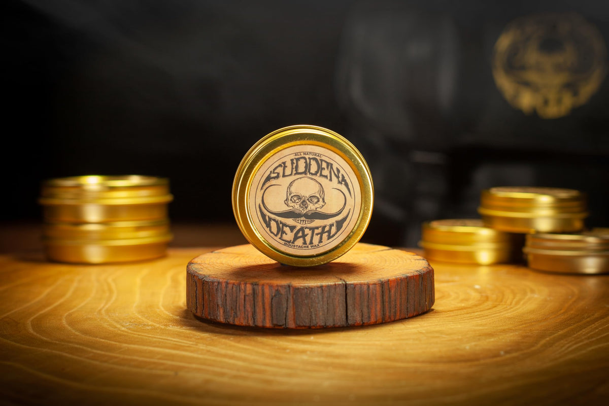 Lifestyle shot of a man using THE VINTAGE GROOMING CO. Mustache Wax