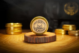 Lifestyle shot of a man using THE VINTAGE GROOMING CO. Mustache Wax