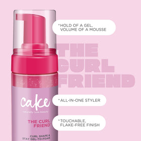 Lifestyle shot of Cake Beauty The Curl Friend Gel-to-Foam Curl Styler in a bathroom setting