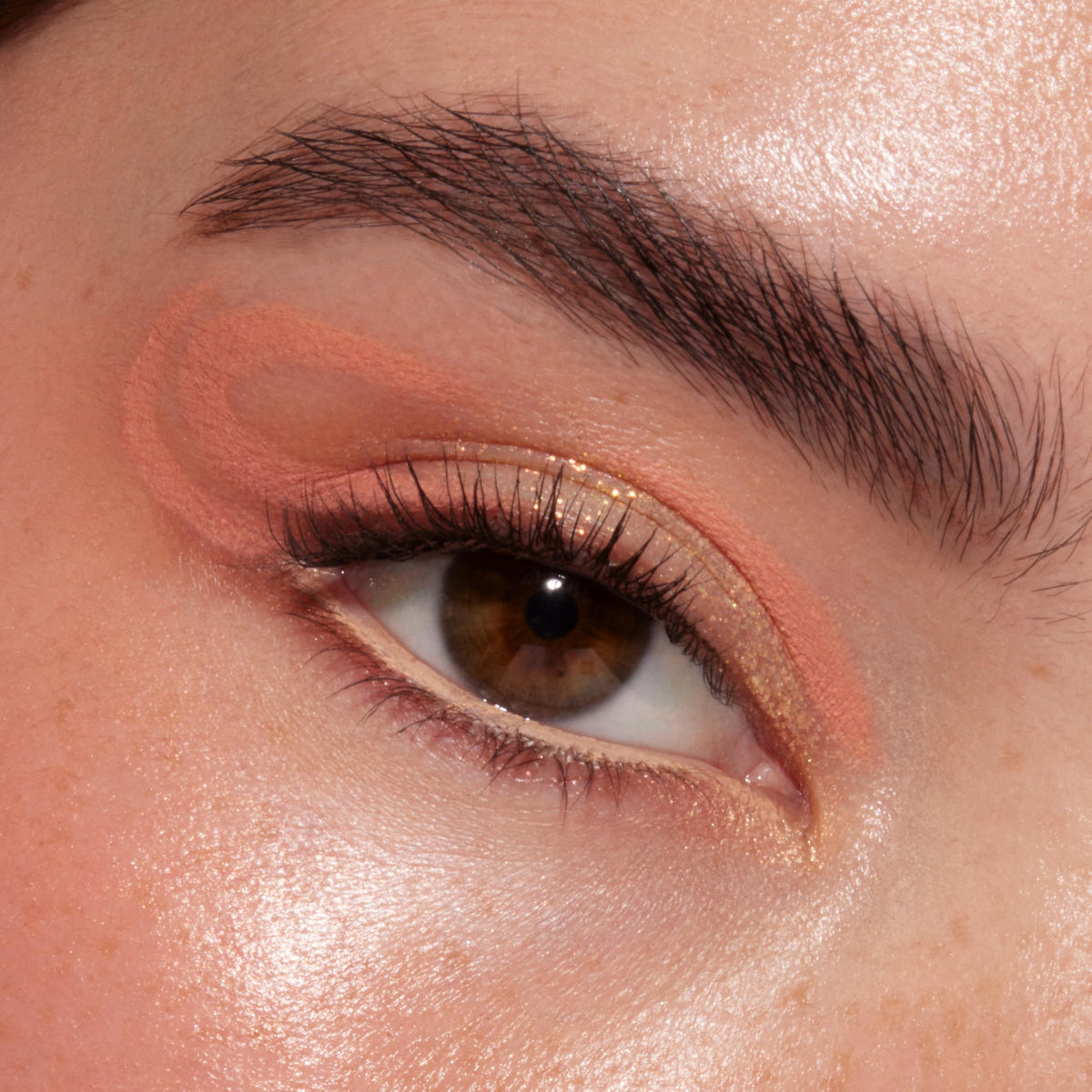 Lifestyle shot of ColourPop Baby Got Peach Eyeshadow Palette in use