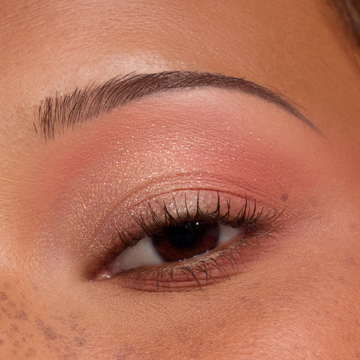 Lifestyle shot of ColourPop Peach Jelly Palette in a makeup setup