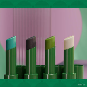 Lifestyle shot of Dr. PAWPAW Elphaba balms on a vanity