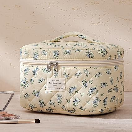 Lifestyle shot of HBselect makeup bag set in a travel setting