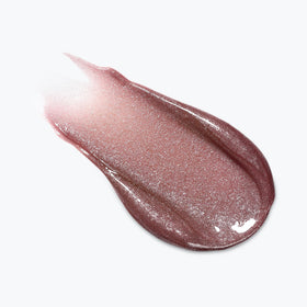 Lifestyle shot of L'Oreal Paris Lip Oil in makeup bag