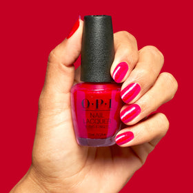 Lifestyle shot of nails painted with OPI Big Apple Energy
