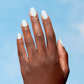 Lifestyle shot of OPI Nature Strong nail polish applied on manicured nails