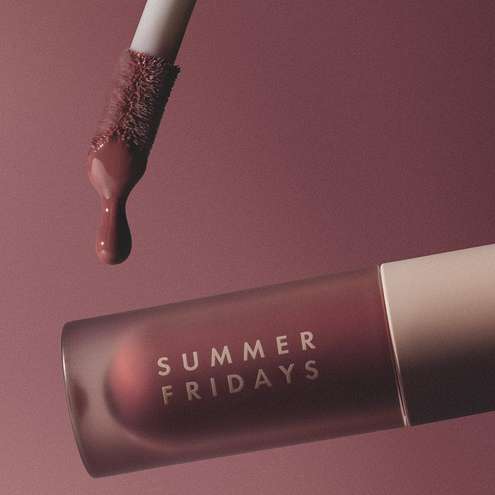 Lifestyle shot of Summer Fridays Dream Lip Oil in use