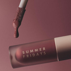 Lifestyle shot of Summer Fridays Dream Lip Oil in use