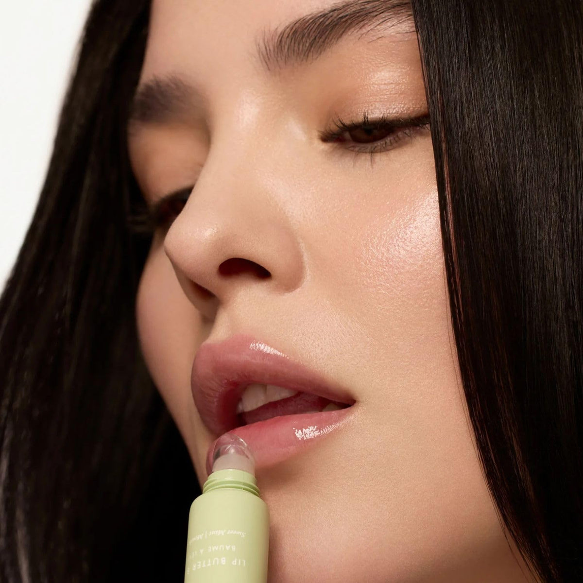 Lifestyle shot of Summer Fridays Lip Butter Balm on a vanity