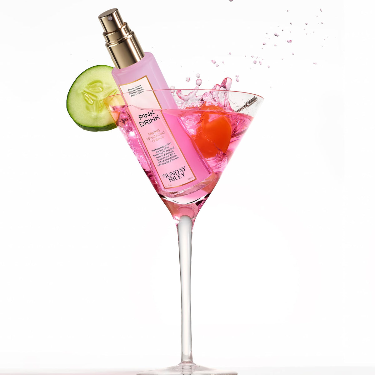 Lifestyle shot of Sunday Riley Pink Drink Skin Firming Essence Mist in use