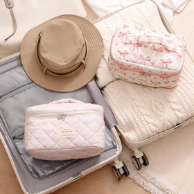 Lifestyle shot of uekeboag Large Floral Cotton Makeup Bag in use
