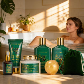 LILY ROY body cream and bath oil displayed with eucalyptus leaves